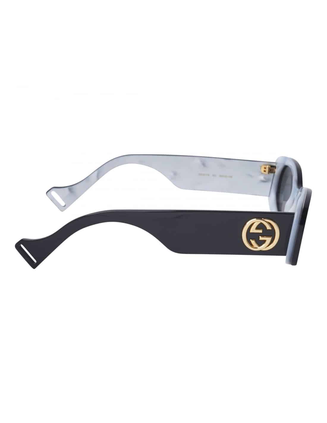 Lentes de sol GG0517S 001 Oval Shape Negro Transferencia Blanco