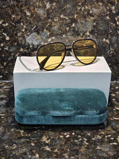 Lentes de sol GG0447S 002 Aviator Negro Ambar Transparente
