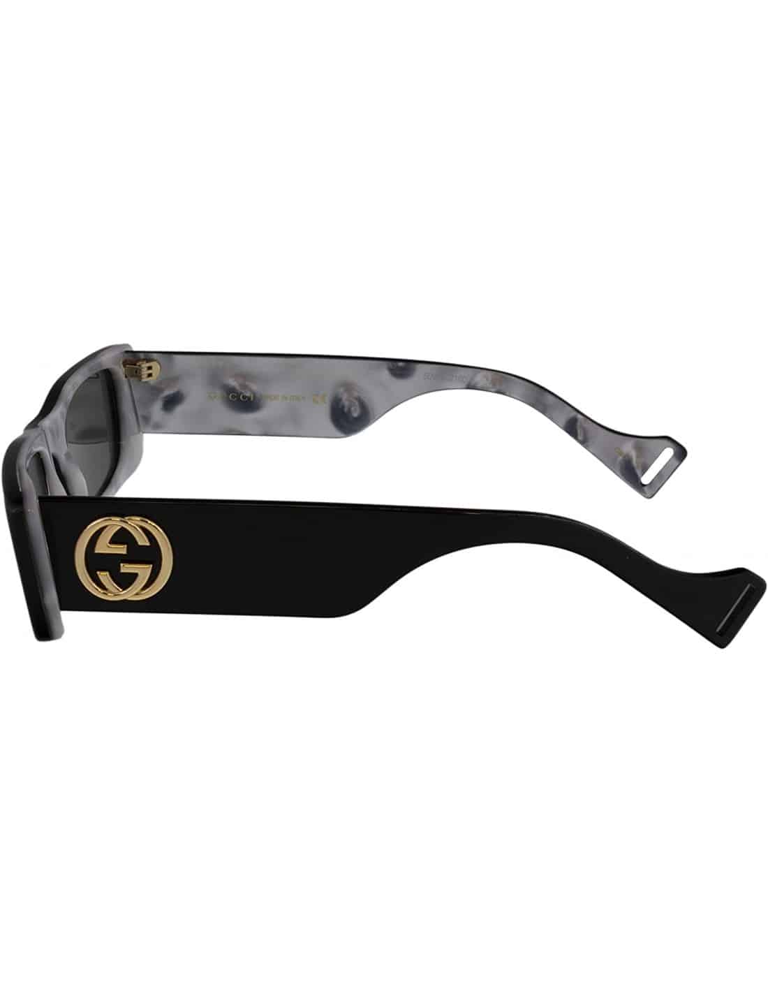 Lentes de sol GG0517S 001 Oval Shape Negro Transferencia Blanco